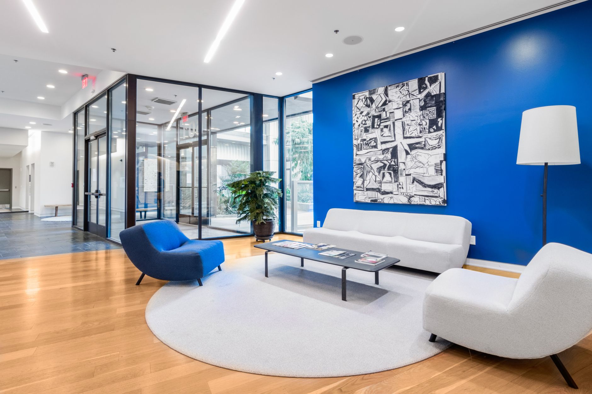 waiting area next to the entrance to a building